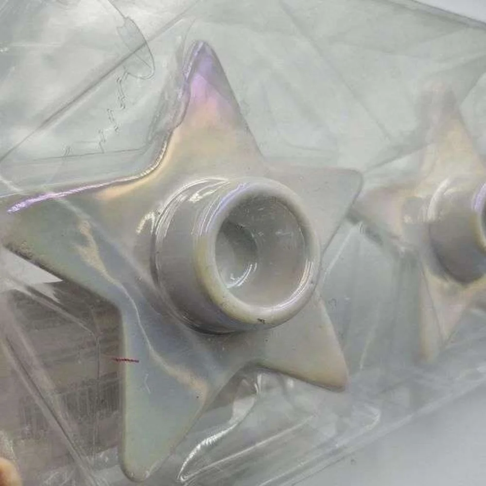 2 Star-Shaped Candle Holders